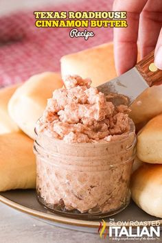 a person is spreading cinnamon butter on bread