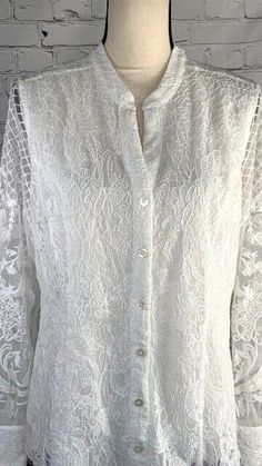 Soft Surroundings Button Front Lace/Embroidered Fiori Blouse Ivory Pearl Medium. | eBay Spring Wedding Button-up Blouse, White Lace Top With Floral Embroidery And Long Sleeves, White Bohemian Blouse With Button Closure, Long Sleeve Lace Blouse With Button Closure, Elegant Lace Blouse With Chikankari Embroidery, Formal White Blouse With Lace Work, Formal White Lace Work Blouse, Long Sleeve Blouse With Button Closure For Wedding, Formal Lace Blouse With Button Closure