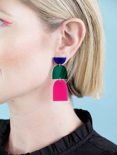 Meet "The Drop" minimalist multi color laser cut acrylic earrings in translucent magenta, transparent blue and transparent emerald. Lightweight, comfortable, durable, and easy to wear. Earring posts and ear nut are made from surgical stainless steel with a gold coating - lead and cadmium free and nickel safe. If you have ultra-sensitive ears or require clip-ons, please reach out and we can talk about modifications that can be made to ensure you have the perfect earring for you. Dimensions: 2.5" Acrylic Earring, Laser Cut Earrings, Multicolor Earrings, Contemporary Earrings, Translucent Powder, 3d Laser, Acrylic Jewellery, Laser Cut Acrylic, Earring Posts