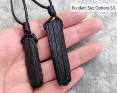 Beautiful handmade raw Black Tourmaline stone pendant, with an adjustable black necklace cord. Black Tourmaline is a powerful protection amulet, EMF protection, balancing, and grounding stone and therefore can bring these qualities to the wearer. This necklace is a unique creation that will shine out the uniqueness in you. It can be a great gift for your loved man or yourself! *'¨) ¸.*'¸.**'¨) ¸. (¸.*' (¸.*` ♥ *FREE INTERNATIONAL SHIPPING ►►You will receive one stone pendant that has been chosen Handmade Black Necklace For Personal Use, Handmade Black Necklace, Handmade Black Necklaces, Handmade Black Jewelry For Personal Use, Black Jewelry With Adjustable Cord For Healing, Black Spiritual Necklace With Adjustable Length, Adjustable Black Amulet Necklace, Black Necklace With Adjustable Cord As Gift, Birthday Gift For Boyfriend