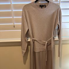 Minimal Wear Elegant Long Midi Dress For Loungewear, Chic Long Dress For Loungewear, Chic Long Loungewear Dress, Elegant Loungewear Dress With Side Slits, Long Sleeve Dresses With Side Slits For Daywear, Long Sleeve Maxi Dress With Side Slits, Chic Long Midi Dress For Loungewear, Chic Longline Maxi Dress For Loungewear, Chic Long Dresses With Side Slits