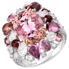 Inspired by the JOY of experiencing a gushing waterfall, this diamond cluster ring is studded with a beautiful mix of brilliant and rose-cut diamonds: 79 brilliant-cut diamonds, 1 rose-cut oval, 1 rose-cut pear, 1 rose-cut round, 1 rose-cut trillioncut & multi-shape pink tourmaline, and cabochon gemstones dripping delicately. This ring from our Cascade Collection is meticulously crafted in 18 KT white gold. The total diamond weight is 3 3/8 CT and the total gemstone weight is 6 1/4 cts. Drawing from a century of expertise in the diamond and jewelry industry, HARAKH was launched in 2017, to introduce the finest gemstones and the most exceptional craftsmanship for discerning jewelry collectors globally. All our precious stones are responsibly sourced and less than 0.5% of the world's gemston 1 Rose, Cluster Engagement Ring, Colorless Diamond, Tourmaline Stone, Cabochon Ring, Modern Ring, Jewelry Manufacturers, Diamond Cluster Ring, Rose Cut Diamond