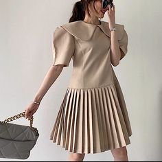 Nwot Minimalist Pleated Dress In Beige Size M-L All Sales Are Final. No Returns Or Exchange Formal Beige Pleated Mini Dress, Beige Mini Dress For Spring Office Wear, Beige Mini Dress For Office In Spring, Beige Knee-length Mini Dress For Office, Casual Pleated Mini Dress For Office, Spring Office Lady Beige Dress, Beige Office Lady Dress For Spring, Elegant Beige Shift Mini Dress, Peter Pan Neck