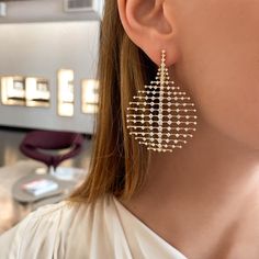 Steal the spotlight with these unexpected statement earrings, featuring 5.60 carats of round brilliant diamonds set in 18K yellow gold. Part of Fernando Jorge’s Brilliant Collection, this design is an ethereal tribute to the inherent beauty of each brilliant cut diamond. What makes these earrings truly special is the impossibly delicate gold lattice structure, flexibly moving with you as it showcases each radiant stone. Exquisite Diamond-accent Earrings For Party, Exquisite Earrings With Diamond Accents For Party, Exquisite Diamond Accent Earrings For Party, Exquisite Diamond Accented Earrings For Party, Glamorous Brilliant Cut Diamond White Earrings, Dazzling Yellow Gold Diamond Earrings For Evening, Glamorous Brilliant Cut Diamond Earrings, Luxury Gold Bridal Earrings With Diamond Accents, Exquisite Diamond White Diamond Earrings For Party