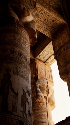 the columns are decorated with egyptian designs