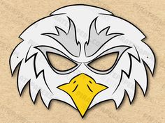 an eagle's head with white and yellow feathers is shown in the shape of a mask