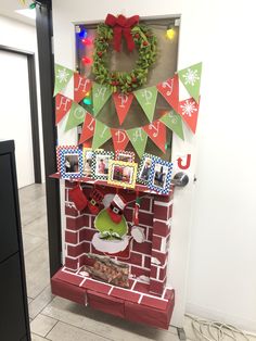 an office decorated for christmas with decorations