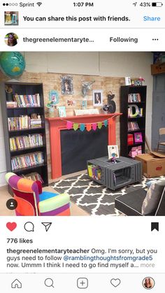 a living room filled with furniture and bookshelves next to a fire place in the corner