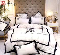 a chanel bed with white and black comforters