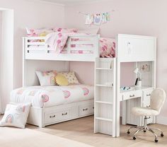 a child's bedroom with pink walls and white furniture, including a bunk bed