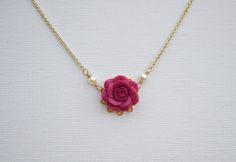 Small Magenta Rose Necklace. Bradley Delicate Necklace in Magenta Rose Elegant Rose Red Necklace With Rose Design, Elegant Pink Rose Necklace, Pink Flower-shaped Necklaces With Roses, Elegant Rose Red Flower Necklaces, Elegant Rose Red Flower Necklace, Delicate Rose Necklace With Roses Detail, Delicate Pink Necklace With Rose Design, Dainty Rose-colored Necklace For Wedding, Coral Jewellery