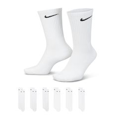 The Nike Everyday Cushioned Crew Socks feature a ribbed arch band for a snug fit for your everyday adventures. The thick terry sole provides comfort, and impact absorption for your workouts and the sweat-wicking fabric keeps your feet dry and comfortable. The straightforward Nike Swoosh on the upper adds a sporty look. Crew design covers ankle and lower calf. Dri-FIT technology keeps your feet dry. Reinforced heel and toe for durability. Arch compression offers a snug, breathable fit. Fabric: 69 Dri Fit Socks, Nike Crew Socks, Workout Fits, Nike Swoosh, Sporty Look, Dear Santa, 6 Packs, 6 Pack, Mens Socks