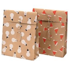 two brown paper bags with snowmen on them