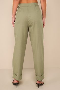 Step out knowing you look effortlessly cool in the Lulus Complete Vibe Olive Green Cotton High-Rise Straight Leg Pants! Lightweight, linen-like woven cotton shapes these covetable pants that have a high-rise fit, belt loops, and a hidden zip fly with top clasp closure. Functional front diagonal pockets and a back decorative welt pocket top the straight legs, which finish at folded cuffs. Pair with the matching top for a complete look! Fit: This garment fits true to size. Length: Ankle length. Si Khaki Linen Bottoms With Pockets, Khaki Linen Pants With Elastic Waistband, Relaxed Fit Cotton Pants With Rolled Hem, Relaxed Fit Linen Khaki Bottoms, Relaxed Fit Khaki Linen Bottoms, Khaki Relaxed Fit Linen Bottoms, Chic Cotton Bottoms In Flax Color, Summer Linen Ankle-length Chinos, Spring Linen Tapered Leg Chinos