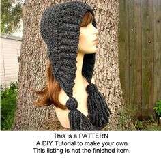 a crocheted hat and scarf on top of a mannequin's head