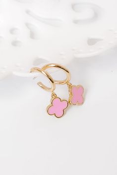 - These hoops are so cute they will have to look twice! - Gold colored metal material - .5 inch huggie hoops with dangling pink hued quatrefoil charms - Post backs Huggie Hoop Earrings, Metal Material, So Cute, To Look, Gold Color, That Look, Hoop Earrings, Charms, Pink