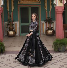 Traditional Black Printed Navratri Chaniya Choli for Women, Navratri Choli, Festive & Wedding Wear Lehenga, Navratri Garba lehenga Choli, Ship to USA, Navratri lehenga for women, Women Lehenga choli dress, women tradition lehenga. 👉🏻 Lehenga :- Lehenga :- (Full-Stitched) Fabric & Work :- 14 Kg Printed Rayon With Gota Patti Lace And Printed Kali Pattern. Length :- 42'' Waist :- 42''  Inner :- Cotton Flair  :-  5 Mtr Closure :- Chain Attached & With Dori Latkan Stitching Type :- Kali Pattern 👉🏻 Blouse:- Blouse :- (Full-stitched) Fabric & Work :- 14 Kg Printed Reyon With Petch and Kodi Lace. Size :- 40''Stitched (User can Alter upto 42''-44'') Neck :- Round Neck   Sleeves :- Full Sleeves 👉🏻 Dupatta:-  Fabric & Work:- 14 Kg Printed Rayon Petch With Kodi Lace. Length:- 2.3 Mtr 👉🏻 Colour Black Palazzo Set With Zari Work For Navratri, Festive Bollywood Black Palazzo Set, Black Palazzo Set For Party And Navratri, Black Lehenga For Eid, Bollywood Black Palazzo Set For Festivals, Black Bollywood Palazzo Set For Festivals, Black Traditional Drape Dress For Navratri, Black Semi-stitched Dupatta For Navratri, Black Traditional Wear With Dupatta For Navratri