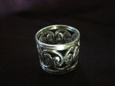 "The Excellence of Old Metalsmithing! Wire lace ring, handcrafted using the ancient tradition of filigree. Ring size 7 1/2. Weight 0.24 oz Length 5/8 of an inch. Another example of finely fabricated traditional wire work. Oxidized to give the scroll design that antique look against the shimmer of high polish finish. Seamless, which means ring can not be sized without destroying the continuity of the design. So each ring has to be built from \"the ground up\". THE AESTHETICS OF AFRICAN \"BEAUTY\" Traditional Handmade Sterling Silver Filigree Ring, Silver Oxidized Filigree Ring With Ornate Style, Ornate Sterling Silver Filigree Ring With Oxidized Finish, Antique Sterling Silver Filigree Ring Collectible, Handmade Sterling Silver Filigree Ring Spiritual, Dream Bracelet, Lace Ring, Scroll Design, Filigree Design