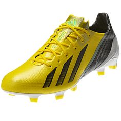 the adidas soccer shoe is yellow and black