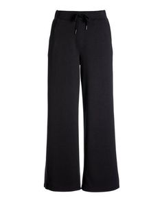 Crafted from a soft knit with a hint of stretch, our Luxe Lounge Drawstring Wide Leg Pant offers effortless polish in an easy, cropped length. Designed with an elastic drawstring waist and slash pockets, it pairs beautifully with our mock neck top for a refined-casual look. | Boston Proper - Black - Luxe Lounge Drawstring Wide Leg Pant - 2XS Chic Pull-on Sweatpants For Loungewear, Versatile Wide Leg Pull-on Lounge Pants, Fall Wide Leg Pull-on Pants For Loungewear, Versatile Pull-on Wide Leg Pants For Loungewear, Stretch Wide Leg Pants For Loungewear, Stretch Wide Leg Pants For Loungewear Athleisure, Stretch Wide Leg Pants For Loungewear In Athleisure Style, Athleisure Stretch Wide Leg Pants For Loungewear, Black Wide Leg Pull-on Pants For Loungewear