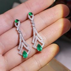 •Condition: Brand new•Center Stone: Natura Emerald from Brazil, 0.7ct+0.27ct•Side Stone: Natural White Diamond, round cut (VS1 clarity and F color) •Earrings Weight: approx 5.66g•Metal Purity: Optional•Sell as pair Each piece is made-to-order with care and special attention to detail. all items are made with conflict-free diamonds and gems.The item will be gift wrapped and shipped.---------------------------------------------------------Available in :14k Rose or Yellow Gold, White Gold18k Rose o Elegant Green Diamond Cut Earrings, Emerald Earrings Drop, Luxury Jewelry Box, Buying An Engagement Ring, Natural Emerald, Conflict Free Diamonds, Wedding Ring Sets, White Diamond, Luxury Jewelry