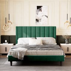 a bed with green headboard and white sheets in a room next to two lamps