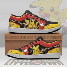 a pair of sneakers with pikachu on them sitting on top of a box