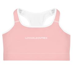 This gorgeous lovable cuties pink sports bra is made from moisture-wicking material that stays dry during low and medium intensity workouts. The bra has support material in the shoulder straps, double layer front, and a wide elastic band to ensure constant support.• 82% polyester, 18% spandex• Fabric weight: 6.78 oz/yd² (230 g/m²), weight may vary by 5%• Moisture-wicking fabric• Four-way stretch material• Scoop neckline and racerback• Flat seams and bias binding that minimize rubbing• Best for A–C cups• Support material in the shoulder straps, double-layered front, and a wide elastic band under breasts for extra supportThis product is made especially for you as soon as you place an order, which is why it takes us a bit longer to deliver it to you. Making products on demand instead of in bu Bias Binding, Pink Sports, Pink Sports Bra, Intense Workout, Moisture Wicking Fabric, Spandex Fabric, Scoop Neckline, Elastic Band, Shoulder Straps