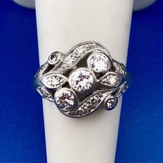 * Art Nouveau Art Deco Platinum Diamond Floral Cluster Engagement Cocktail Ring * Ring Size: 5.00 * Top of ring measures: 5/8" x 3/4" * Round Diamond carat weight: approximately .50 tcw * Diamond color: H-I * Diamond clarity: SI * Weight: 6.0 tgw * Marked: makers marks 50 plat * Condition: Great * Item will be shipped via Register Mail will being video surveilled with a Notary Public and two witnesses.  * (G54)    Exported By ExportYourStore :) Art Deco Multi-stone Diamond Ring, Hallmarked Platinum Cluster Ring, Dazzling Multi-stone Platinum Diamond Ring, Platinum Cluster Multi-stone Diamond Ring, Platinum Multi-stone Cluster Diamond Ring, Round Multi-stone Platinum Diamond Ring, Multi-stone Platinum Diamond Ring, Dazzling Multi-stone Platinum Jewelry, Platinum Multi-stone Diamond Ring With Round Shape