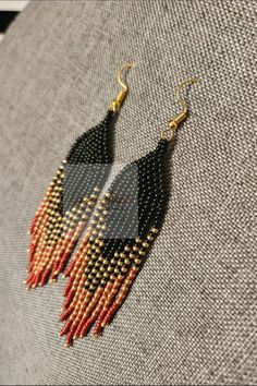 Colors: Black , Gold and Red Orange Dangle Earrings With Black Beads, Orange Earrings With Black Beads As Gift, Orange Earrings With Black Beads For Gift, Red Earrings With Black Beads As Gift, Red Earrings With Black Beads For Gift, Black Long Drop Beaded Earrings For Gift, Handmade Black Beaded Long Drop Earrings, Red Drop Earrings With Black Beads, Earring Inspired