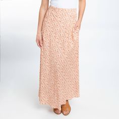 A summer essential, the Halle Maxi Skirt features a gorgeous amber floral pattern, comfortable elastic waistband, and pockets. This lightweight and easy to wear skirt will easily become your new favorite. Perfect as a boho summer skirt for women thanks to the soft flowing material and the soft color. Endless versatility and unfettered comfort make this the maxi skirt you'll reach for time and time again! On casual days, work days, nights out, date nights, to parties, this ankle length skirt will Maxi Skirt With Pockets, Ankle Length Skirt, Skirt For Women, Summer Essential, Skirt With Pockets, Summer Skirts, Boho Summer, Casual Skirt, Skirts With Pockets