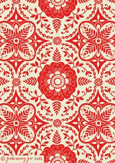 a red and white wallpaper with an ornate design on the bottom half of it