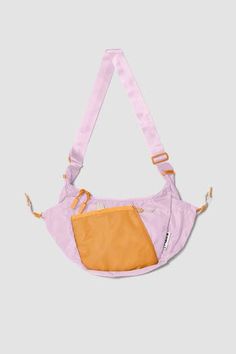 Introducing Crescent Crossbody, designed with lightweight, technical materials, geometric functionality, and intuition. Volume: 4.7 Liters Size: H 8.5in x W 12.2in x D 2.8in Strap length: 59in Shell: 210D recycled nylon N66 baby ripstop Lining: 75Dx150D recycled poly ripstop Versatile Purple Nylon Shoulder Bag, Purple Nylon Bags, Trendy Nylon Shoulder Bag For Outdoor, Trendy Outdoor Nylon Shoulder Bag, Purple Nylon Bags For Outdoor Use, Purple Nylon Bag For Outdoor Use, Purple Nylon Bag For Outdoor, Nylon Shoulder Bag With Functional Pockets For Outdoor, Purple Nylon Bags With Zipper Pocket