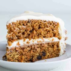 a slice of carrot cake with cream cheese frosting