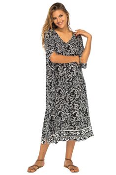 Soft as a daydream, this flowing poncho style black dress sweetens your summer downtime with its light flowing fabric and pastel buttermint hues. Handmade design features a pretty batik floral print, as well as butterfly sleeves that mirror the easy mid-calf hemline. Generously sized to provide ample coverage for womens regular to plus sizes; wear as a beach caftan, lounge dress or maxi cover up for swimwear. Back From Bali is dedicated to creating beautiful, quality clothing with a heart. All o