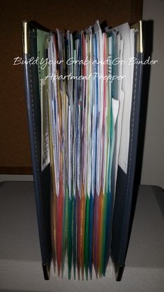 a file cabinet filled with files and folders