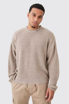 Men’s knitwear has come a long way, which means you can now keep your look cool while you stay warm in our selection of jumpers and cardigans for men. A staple to add into your off-duty rotation, the crew neck jumper is an ideal transition layer that works day to night and smart to casual. If you are looking to up your sweater game without needing to put in any extra effort, our selection of cable knit jumpers is all you need to wear when the cold season kicks in. Looking for a more sophisticated combo? Layer a roll neck jumper under a blazer and finish off with skinny jeans and smart shoes. Sweater Mens Outfits, Crew Neck Textured Knit Sweater For Streetwear, Race Day Outfits, Jumper Designs, Plus Size Joggers, Suits Prom, Going Out Trousers, Fluffy Texture, Pull Oversize