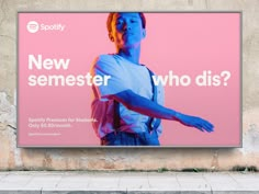 a billboard on the side of a building that says, new semester who dis?