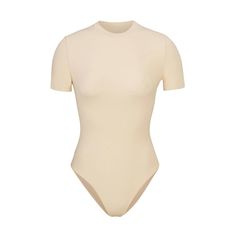 Like your favorite tee, but better! This molds-to-your-body short sleeve bodysuit features a buttery soft fabric, high crew neckline, and brief back for... White Long Sleeves, Waist Shapers, Shirt Bodysuit, Brown Shorts, Bottoming Shirt, Natural Curves, Short Sleeve Bodysuit, Crew Neckline, Soft Fabric