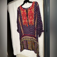 Gorgeous Dress Bohemian Tunic Dress In Viscose, Patterned Tunic Dress For Festivals, Bohemian Long Sleeve Multicolor Print Dress, Bohemian Long Sleeve Viscose Midi Dress, Purple Floral Print Tunic Dress, Purple Flowy Tunic Dress, Multicolor Viscose Dress With Vibrant Print, Multicolor Long Sleeve Viscose Dress, Bohemian Long Sleeve Midi Dress With Vibrant Print