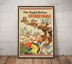 the night before christmas poster with santa claus and reindeers on his sleigh