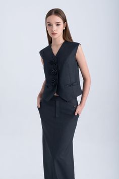 Upgrade your wardrobe with our luxurious vest. Made with high-quality polycotton material, this vest features a modern and flattering straight v-neck design. Elevate your style effortlessly with this versatile and sophisticated piece. Elegant V-neck Vest For Formal Occasions, Fitted V-neck Vest For Office, Elegant Semi-formal Spring Vest, Classic V-neck Office Vest, Elegant V-neck Vest For Office Wear, Chic V-neck Sweater Vest For Work, Elegant V-neck Vest Top, Semi-formal Sleeveless Top For Spring, Sleeveless Semi-formal Spring Top