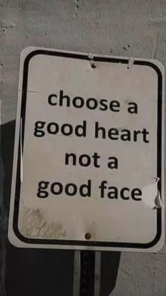 a sign that says, choose a good heart not a good face