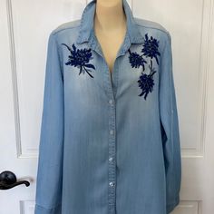 100% Tencel Denim Blue Oversized Tunic Blouse By Velvet Heart In Size Small. Longsleeve, Button Cuffs And Tab For Rolling And Shortening Sleeves. Embroidered Flowers On Both Sides In Blue, Gray And Black. So Pretty! Long Tunic Length. Wear With Leggings Or Skinny Jeans. Excellent Condition! Looks Brand New! Blue Embroidered Collared Blouse, Blue Denim Blouse With Buttons, Blue Denim Blouse With Button Closure, Blue Denim Button Blouse, Blue Denim Buttoned Blouse, Light Blue Long Sleeve Denim Top For Spring, Blue Denim Top With Button Closure And Long Sleeves, Collared Denim Blue Blouse For Spring, Blue Long Sleeve Denim Top With Button Closure