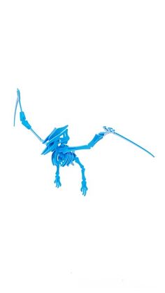 a blue insect is flying through the air