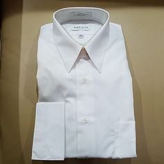 Nwt Van Heusen Dress Shirt. The Shirt Is A Bottom Down With French Cuffs.This Is A New Shirt But There Is Slight Discoloration Around The Neck. This May Come Out In The Laundry And Will Not Be Obvious. Classic Plain Shirt With Relaxed Fit, White Classic Dress Shirt, Relaxed Fit, Classic White Dress Shirt Relaxed Fit, Classic Relaxed Fit Plain Shirt, Collared Plain Formal Tops, Classic White Relaxed Fit Dress Shirt, White Fitted Business Top, Classic Business Tops In Relaxed Fit, Classic Business Tops With Relaxed Fit