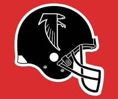 a black and white football helmet on a red background