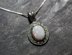 "Opal Pendant set with a Natural Opal - Genuine Opal in a top grade with a lot of natural fire / flash, at 10x8mm, weighing 3 Carats, sourced from Australia. Vintage Pendant design is made of Solid 925 Sterling Silver ☞ made to last. Matching Ring: www.etsy.com/listing/279968220 Matching Earrings: www.etsy.com/listing/555943872 Free Silver Chain with every Pendant order, 18 inch Silver chain (46 cm) ✓ October Birthstone - Genuine & Natural Stones ❀ ⌛Last Pendant left ⌛ ❀ Each Natural Gem is Opal Necklace Vintage, Australia Vintage, Oval Necklace, Matching Ring, Real Jewelry, Vintage Pendant, Matching Rings, October Birthstone, Australian Opal