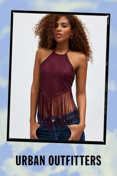 Playful Ecote halter top in a slim & cropped fit. Designed in a glimmering knit featuring a high halter neckline, diamond shaped bodice and open back with die details. Finished with fringe at the hem for western flair. Features Ecote Wynn backless fringe halter top Fringe crop top Stretch knit with shimmer High neckline with halter straps Diamond shaped bodice with fringe hem Open back with double tie details Slim fit Cropped length Adjustable halter straps Double tie closures Content + Care 80% Lurex, 20% nylon Machine wash Imported Size + Fit Model in Black is 5’11" and wearing size Small Measurements taken from size Small Chest: 27.5" Length: 21" | Ecote Wynn Backless Fringe Halter Top in Dark Red, Women's at Urban Outfitters Chic Fitted Halter Top For Festivals, Glamorous Sleeveless Halter Top For Festival, Party Season Halter Neck Crop Top, Summer Evening Crop Top Halter Top, Summer Evening Halter Crop Top, Glamorous Cami Crop Top For Summer, Chic Cropped Top For Party Season, Glamorous Evening Halter Crop Top, Chic Halter Neck Crop Top For Festivals