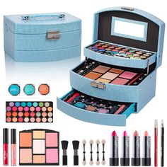 PRICES MAY VARY. WHAT YOU GET: 31 eye shadows, 2 lip glosses, 2 blushes, 4 lipsticks, 1 face powder, 1 lip pencil, 1 bronzer, 1 eye pencil, 1 highlighter, 2 concealers, 6 brushes, 1 reusable train case. COMPLETE COSMETIC SET: This affordable makeup kit with everything needed to get started is perfect for teens or beginners who want to play with makeup without breaking the bank. FRIENDLY TO SKIN: The various cosmetics in the teen makeup kit gift set are hypoallergenic-free, paraben-free and miner Beginner Makeup Kit, Beginner Makeup, Blush Lipstick, Magical Makeup, Kit Christmas, Cosmetic Sets, Makeup For Teens, Affordable Makeup, Christmas Makeup